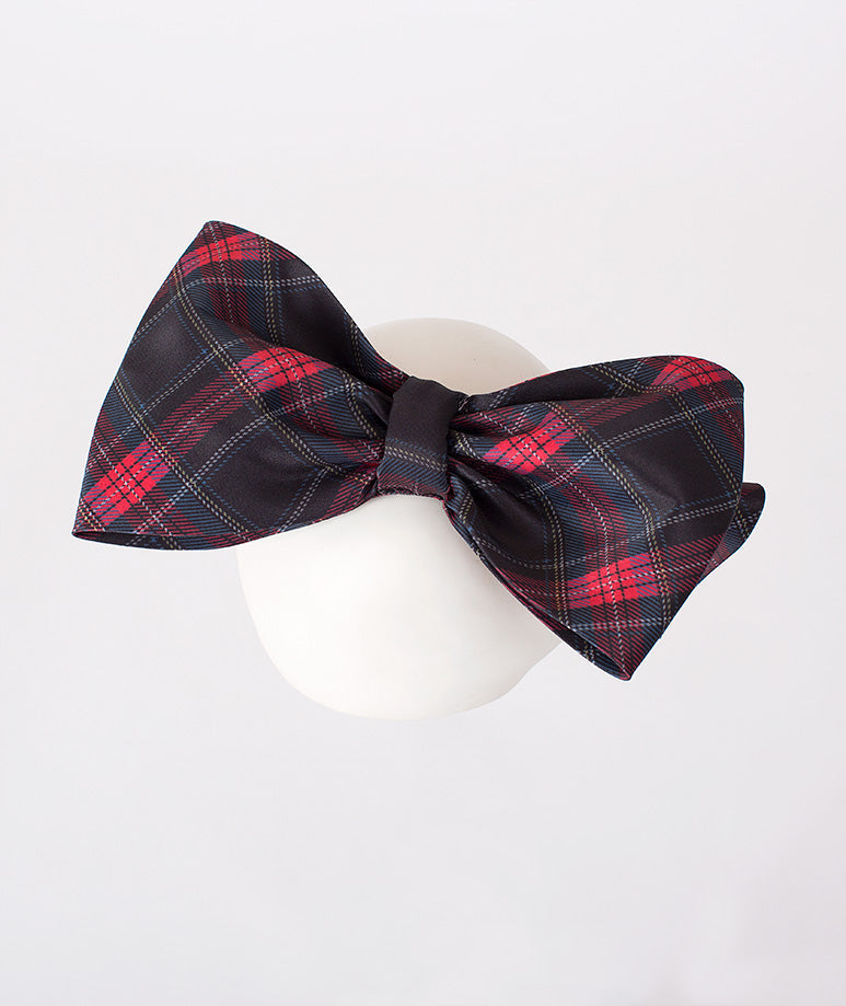Statement plaid bow headband for girls' festive outfits – A bold, plaid bow headband that brings a touch of glamor and cheer to any festive attire.