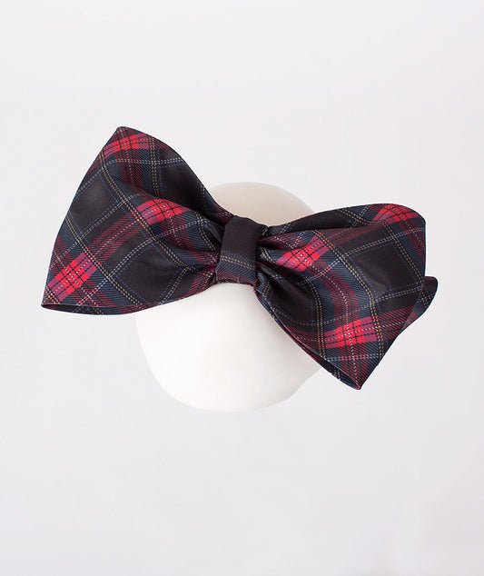 Statement plaid bow headband for girls' festive outfits – A bold, plaid bow headband that brings a touch of glamor and cheer to any festive attire.