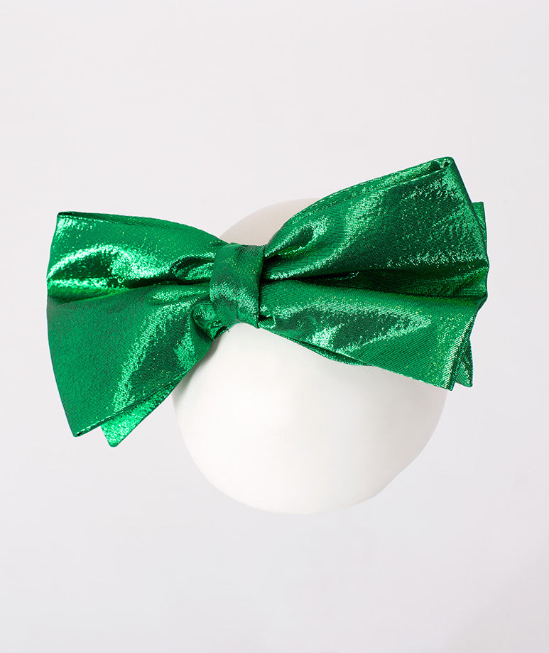 Girls' shiny green metallic bow headband – A vibrant green metallic bow headband, perfect for adding a festive flair to any outfit
