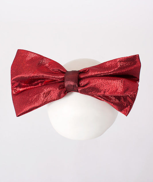 Red metallic bow accessory for girls – This sparkling red bow headband is an eye-catching accessory for holiday events and special occasions.