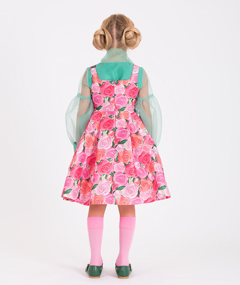 a minty green blouse and a flower-print dress